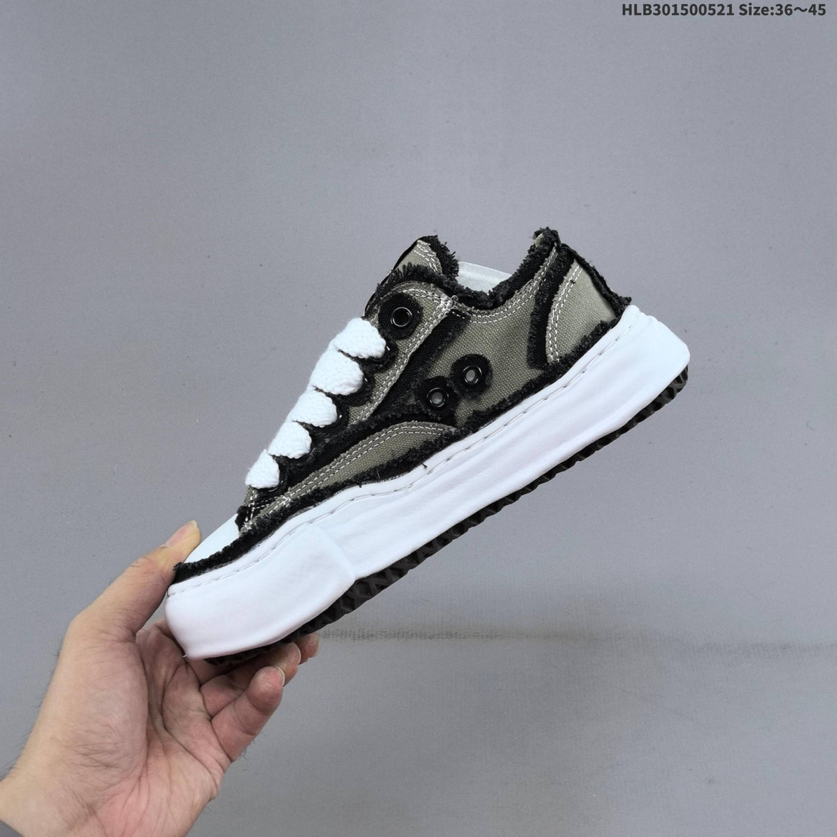 MAISON MIHARA YASUHIRO MMY PETERSON LOW CANVAS SNEAKERS