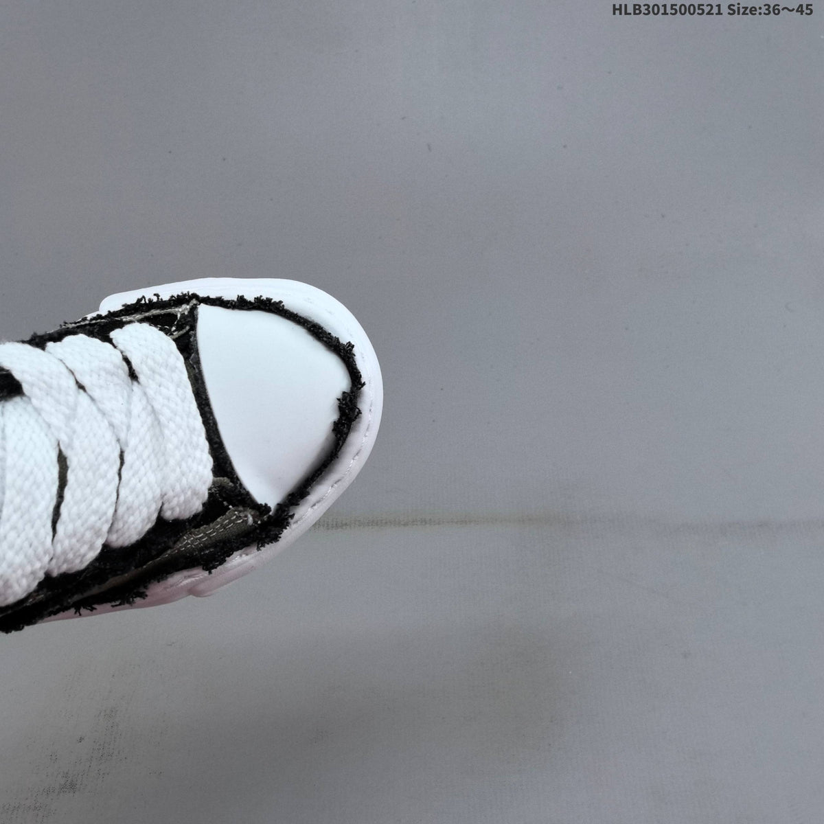 MAISON MIHARA YASUHIRO MMY PETERSON LOW CANVAS SNEAKERS