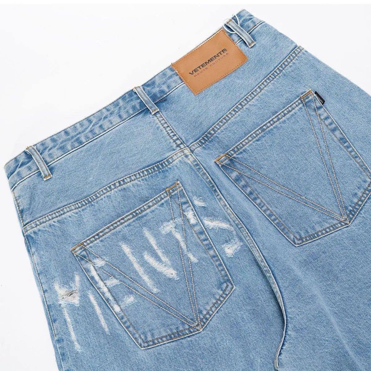 VETEMENTS LOGO DESTROYED BAGGY JEANS
