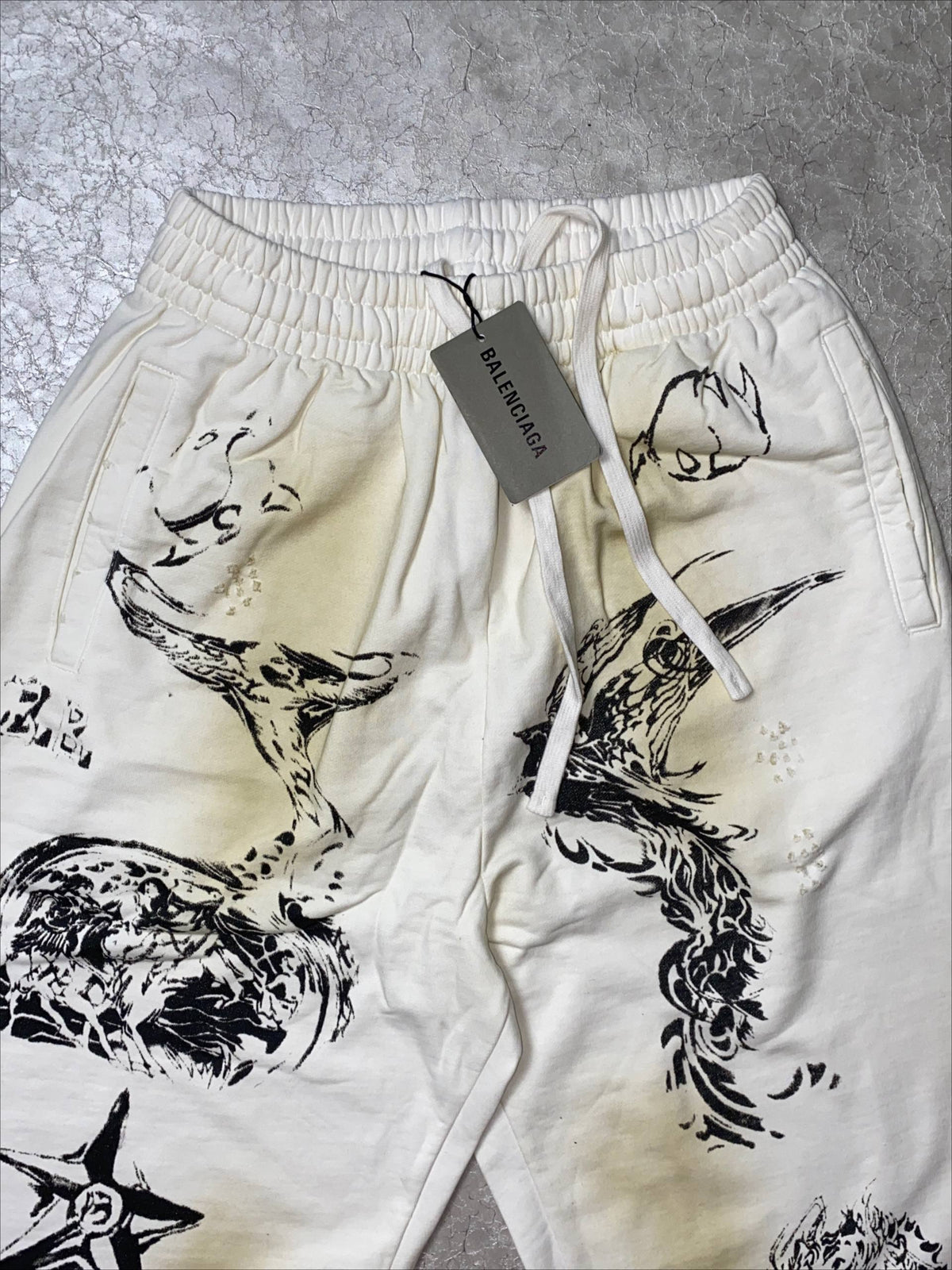 BALENCIAGA TATTO MUD DYED GRAFFITI PANTS