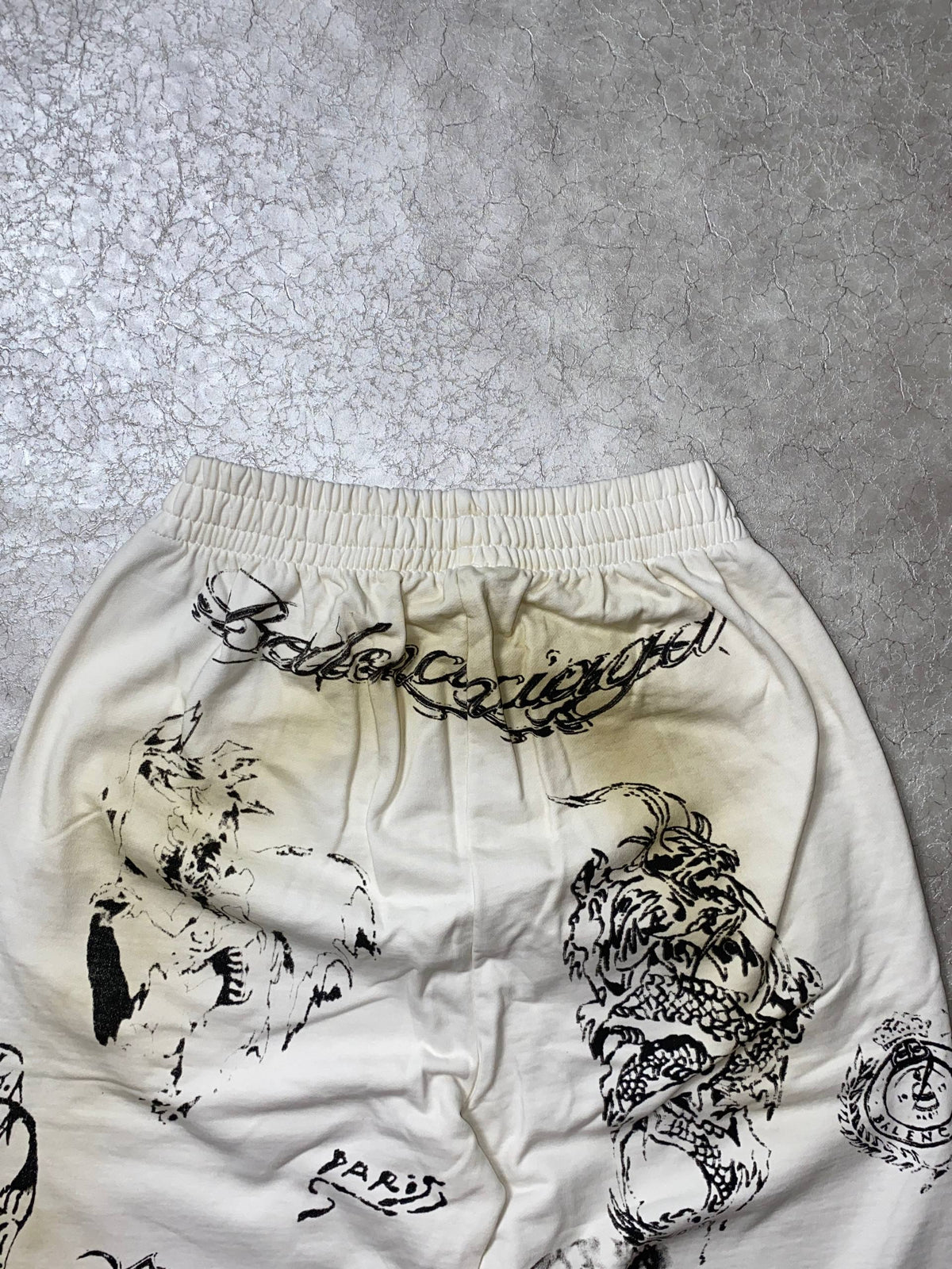 BALENCIAGA TATTO MUD DYED GRAFFITI PANTS