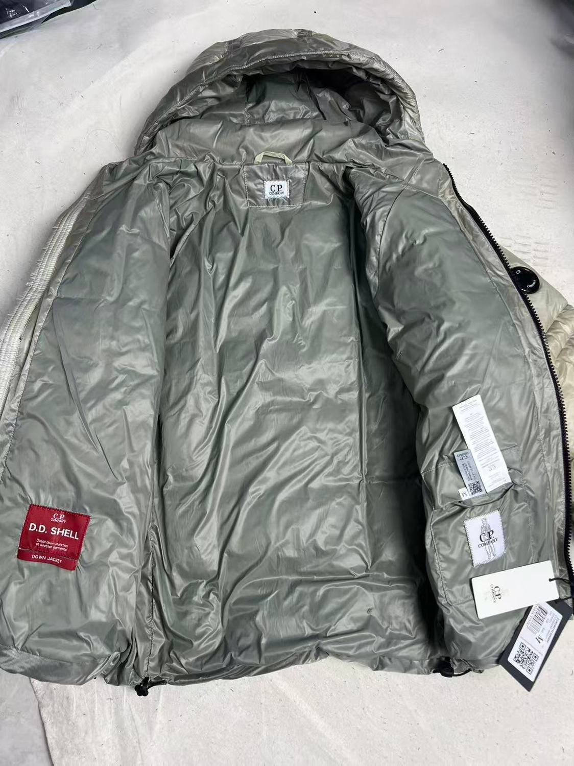 C. P. COMPANY D.D. SHELL HOODED PUFFER JACKET