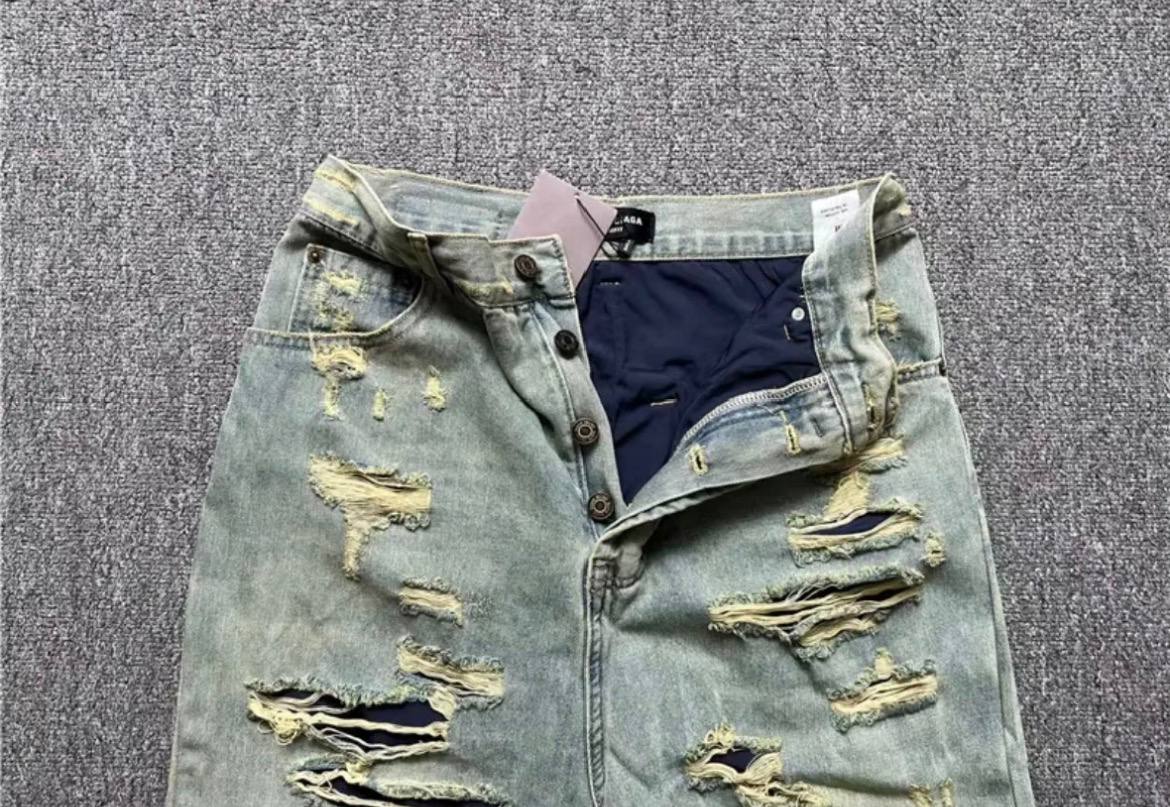 BALENCIAGA BAGGY DISTRESSED JEANS