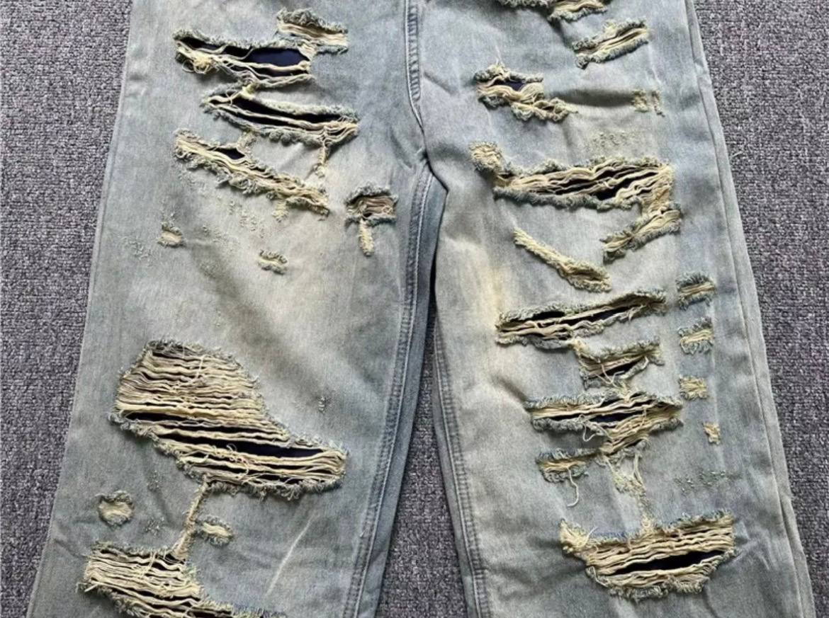 BALENCIAGA BAGGY DISTRESSED JEANS