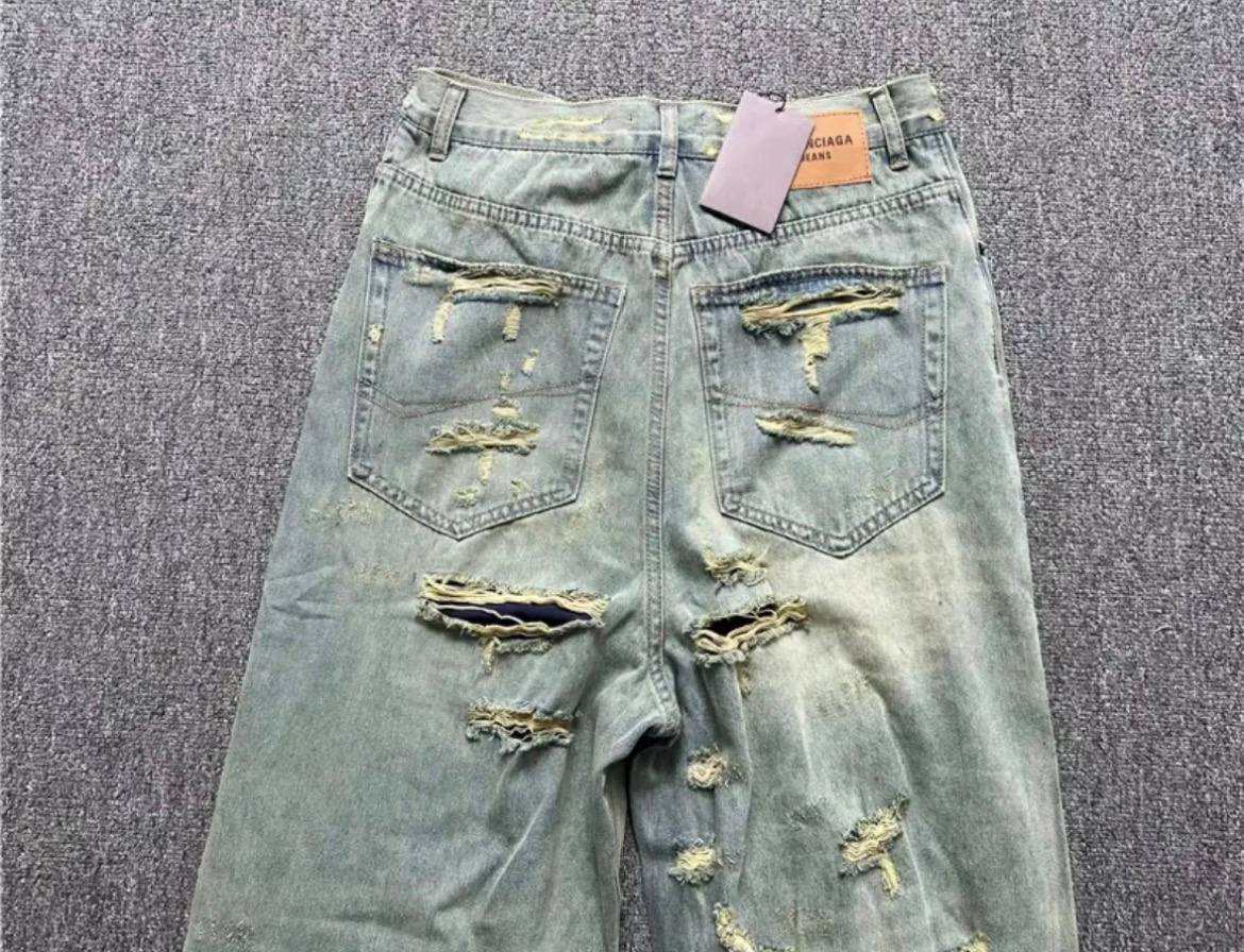 BALENCIAGA BAGGY DISTRESSED JEANS