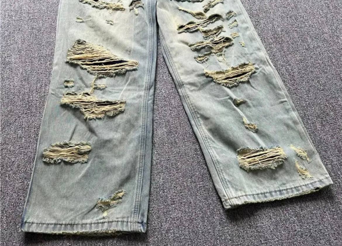 BALENCIAGA BAGGY DISTRESSED JEANS